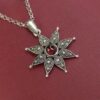 ISTEDDU - Ciondolo a stella in filigrana d'argento e pietra incastonata